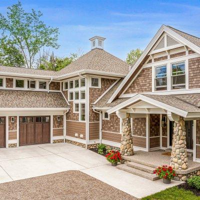 Exterior view: front entry, hinge and garage